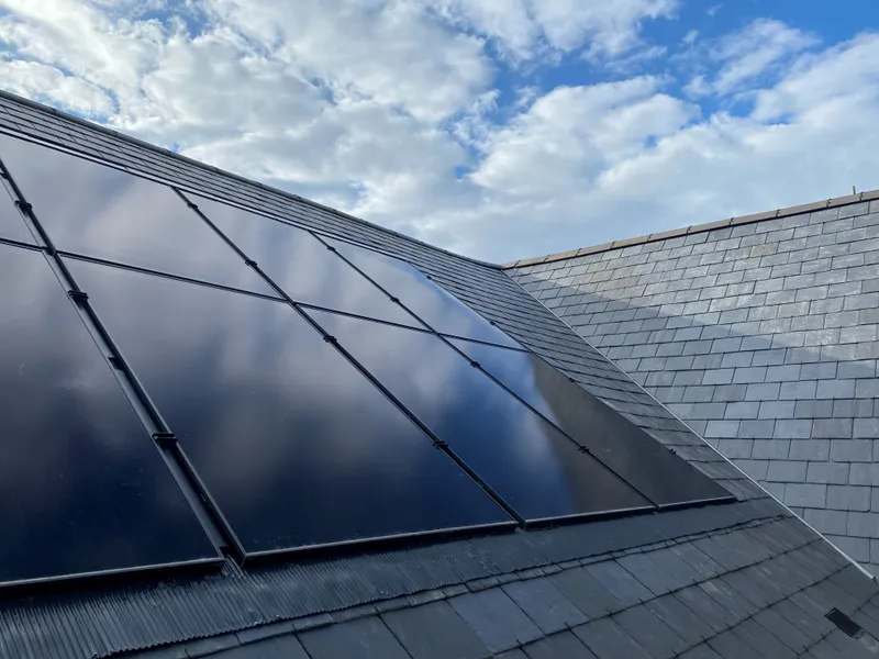 Solar panels fitted flush into a slate roof